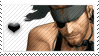 A stamp of Big Boss from Metal Gear Solid 3 against a white background with a black heart next to him.